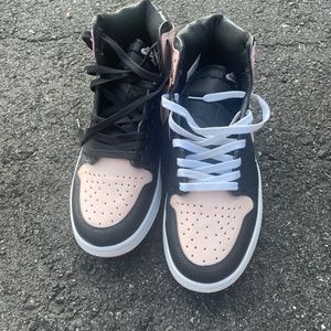 Pink, black, and white Nike air